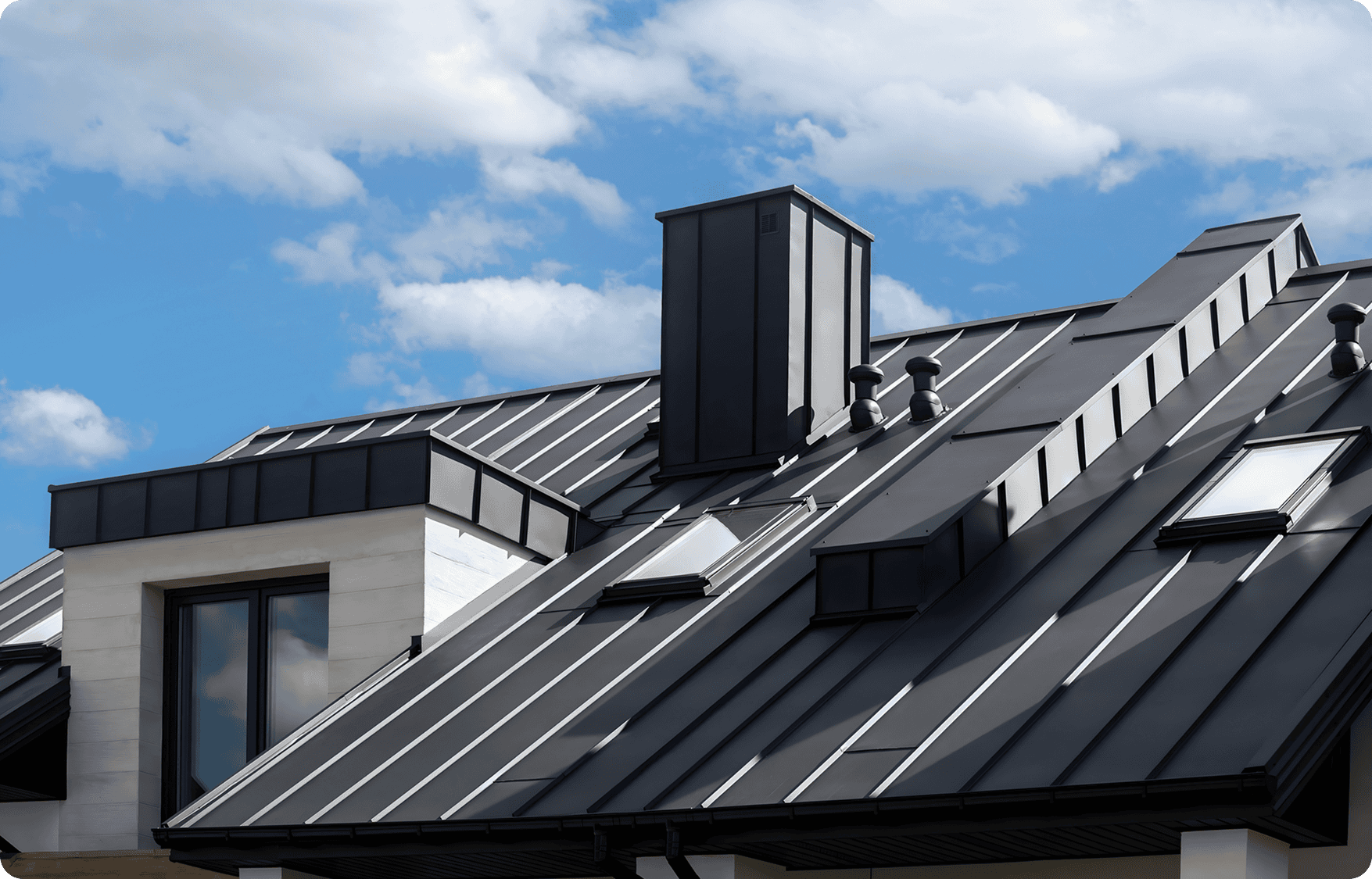 Modern house with black metal roof.