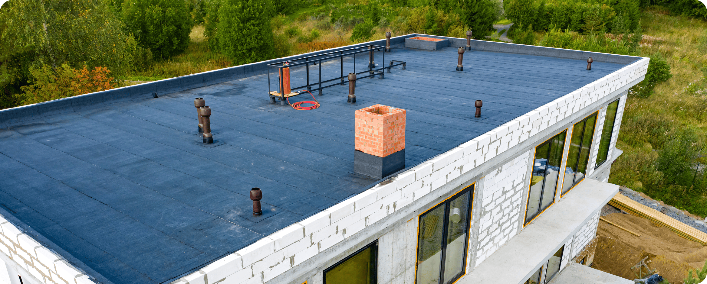 Flat roof on white modern building.